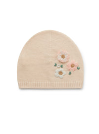 Pink beanie with embroidered flowers