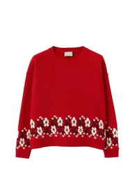 Red sweater with inlaid floral pattern