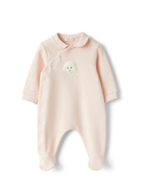 Fleece babysuit with a pink poodle detail