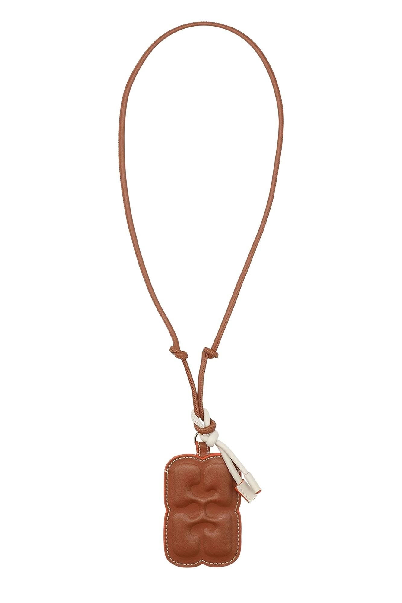Collier avec badge en cuir - Caramel Café