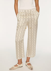 Pantalon Arcade à motif monogramme en soie - Cream