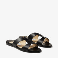 Atia flat sandals in leather - Black