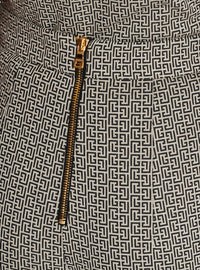 Pantalon flare en jacquard monogramme - Ivoire & Noir