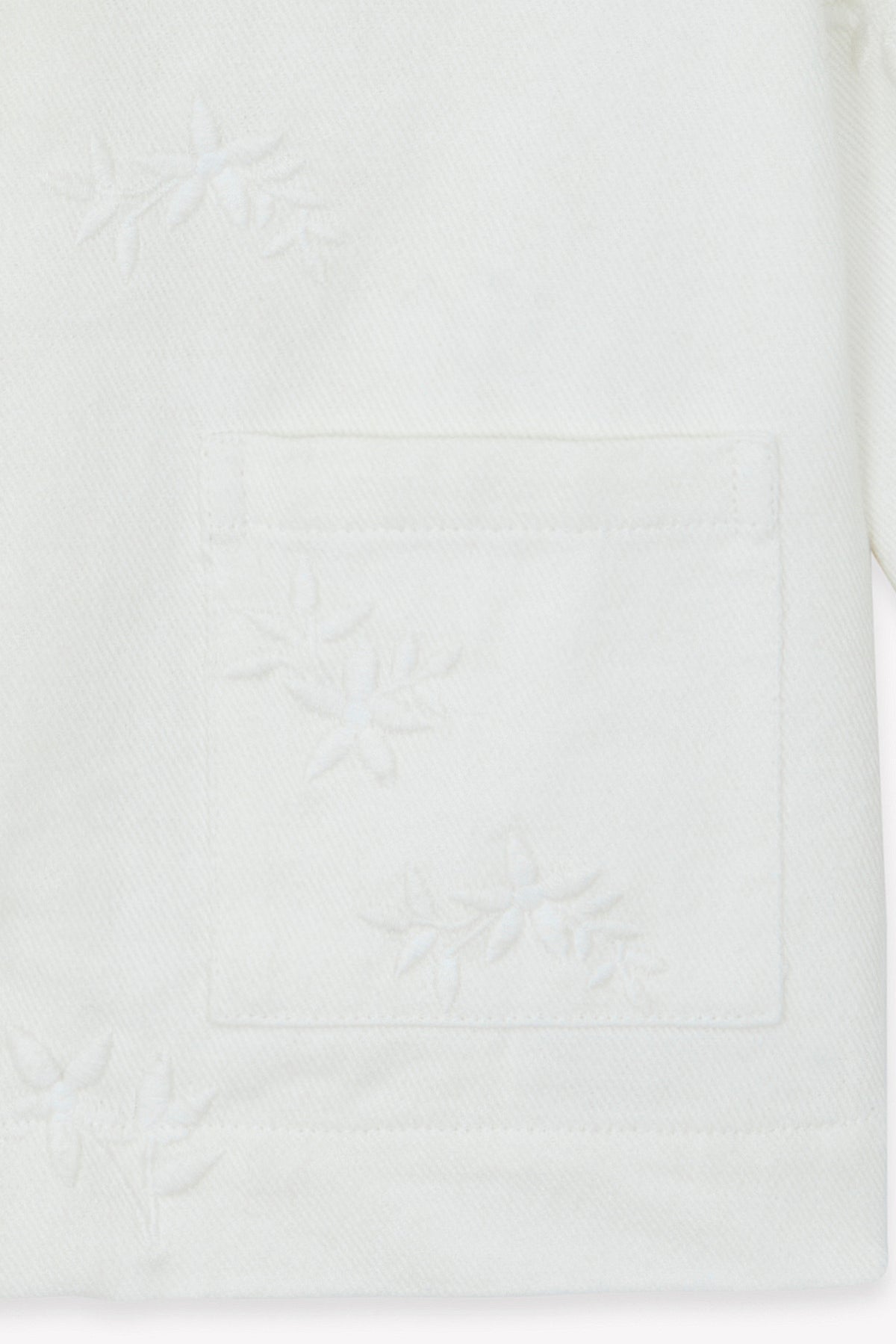 Veste - Ivoire à reliefs