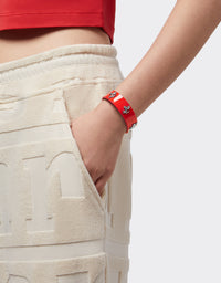 Bracelet unisexe avec clous Cheval cabré en cuir verni - Rosso Dino
