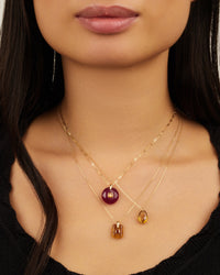 Collier coquillage en or jaune - Rubis & Pierre de soleil