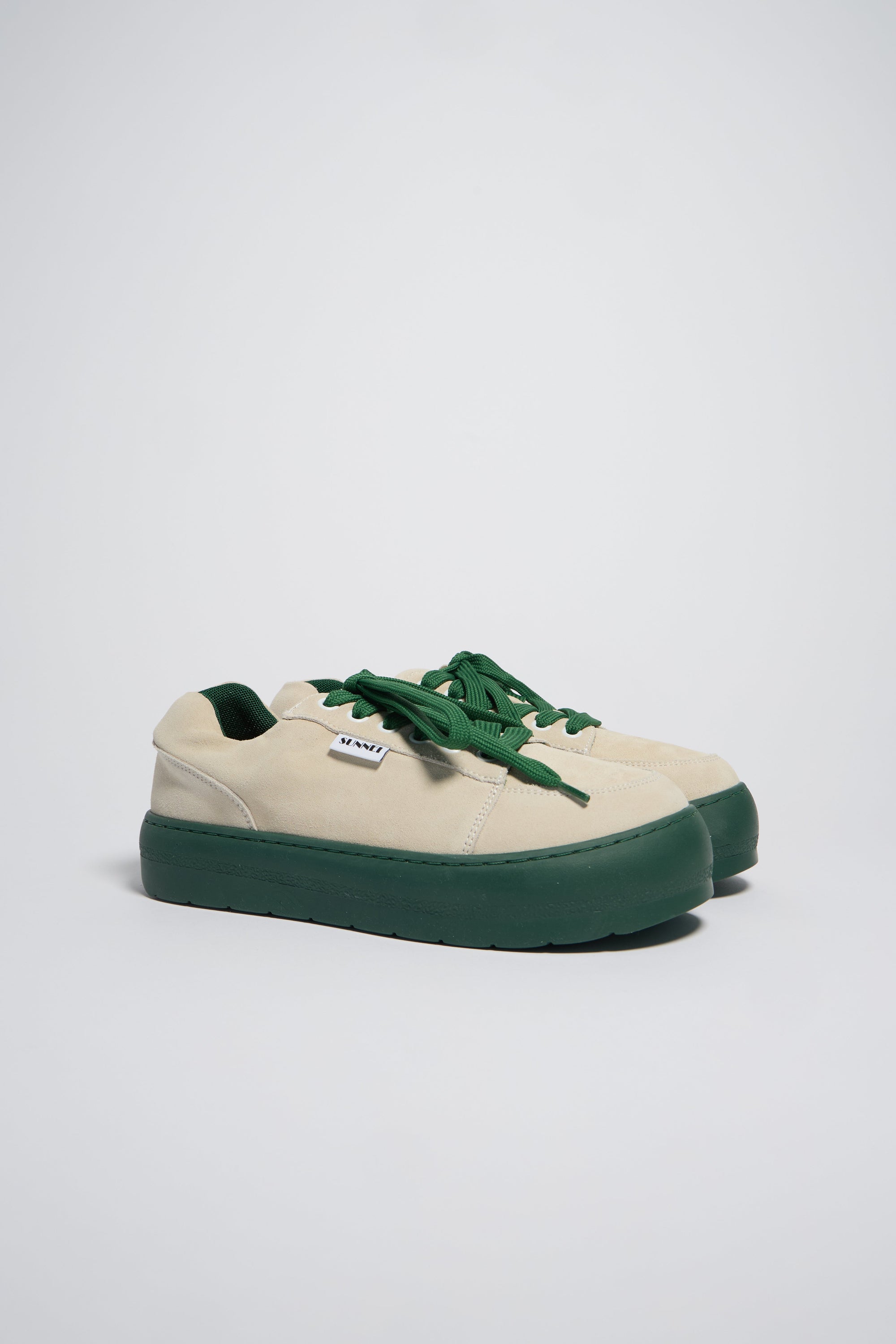 Rêveur sneakers in leather - Off White & Emerald Green