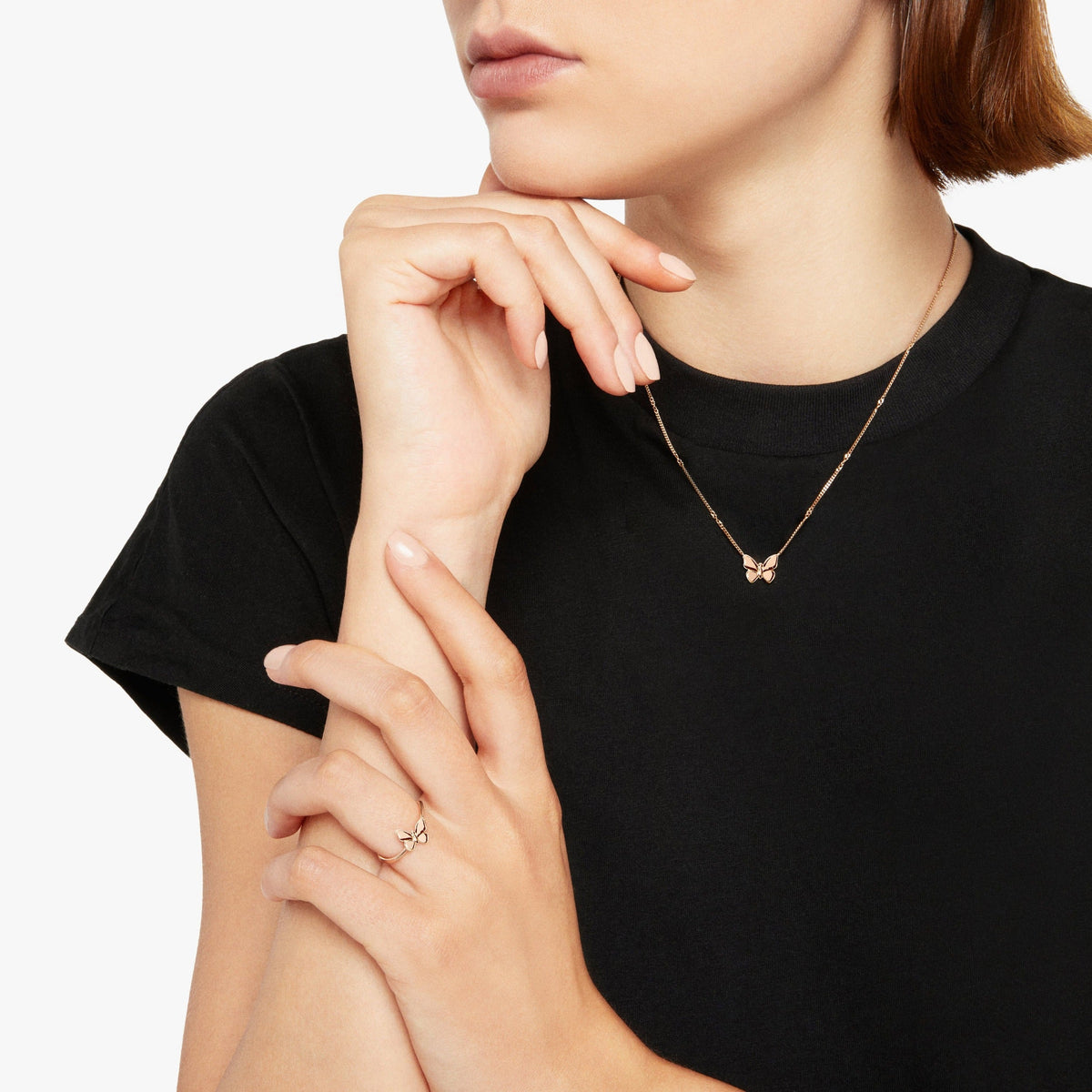 BUTTERFFLY NECKLACE IN 9K ROSE GOLD WITH PLAQUETTE IN 9K ROSE GOLD.