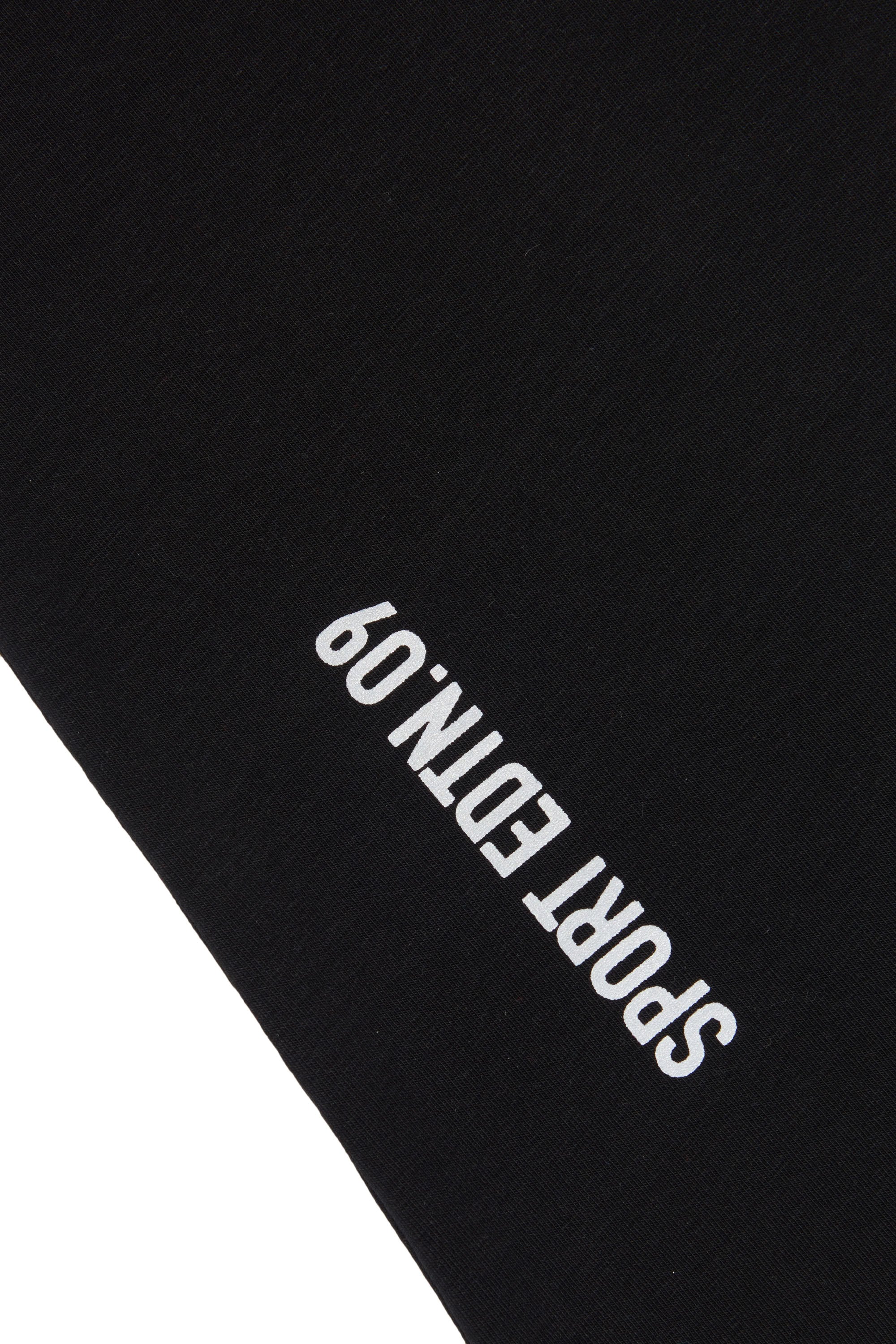 Two-tone flared trousers - Black
