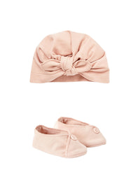 Set cappellino e scarpe rosa