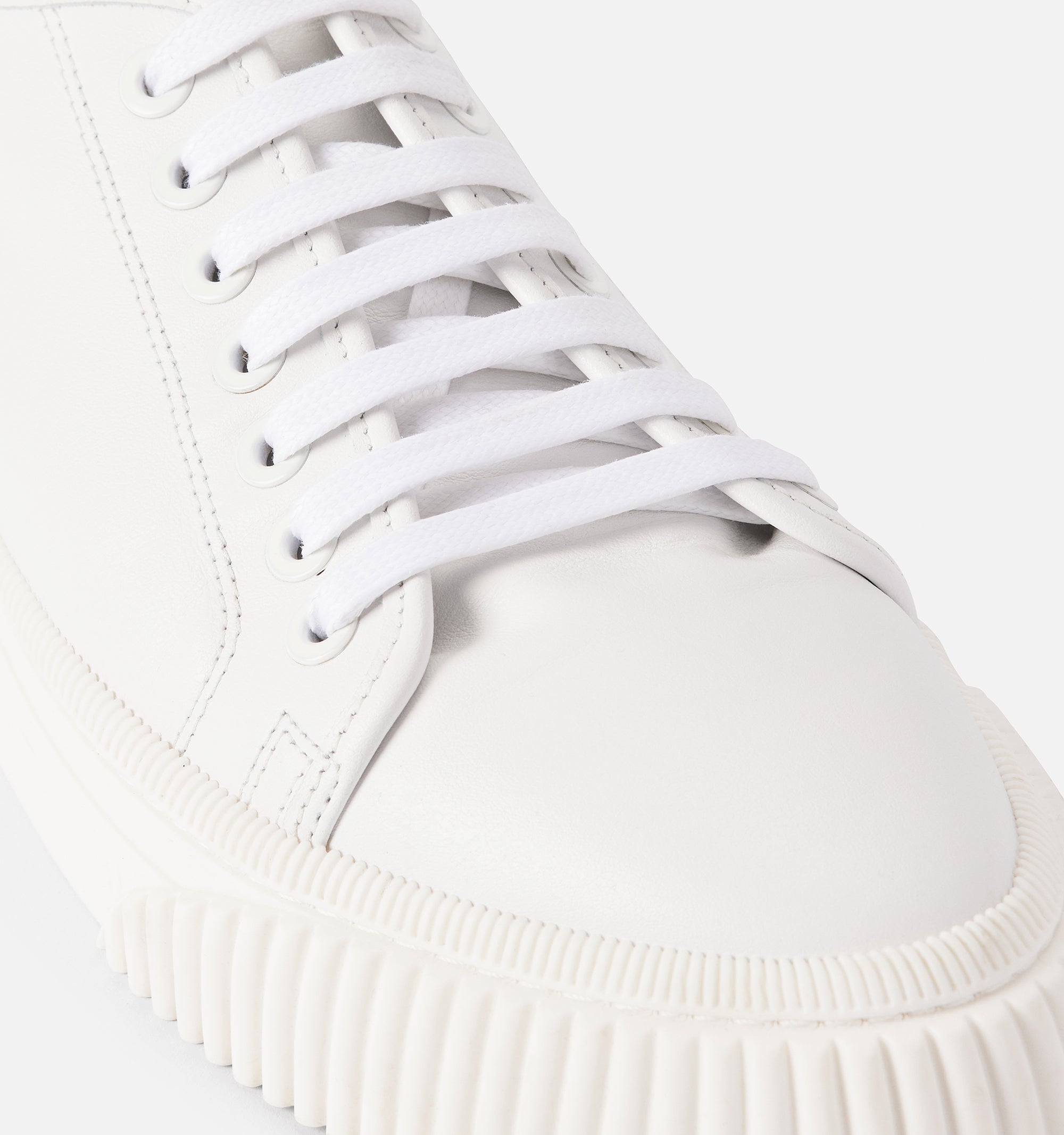 Sneakers basses à lacets en cuir - White