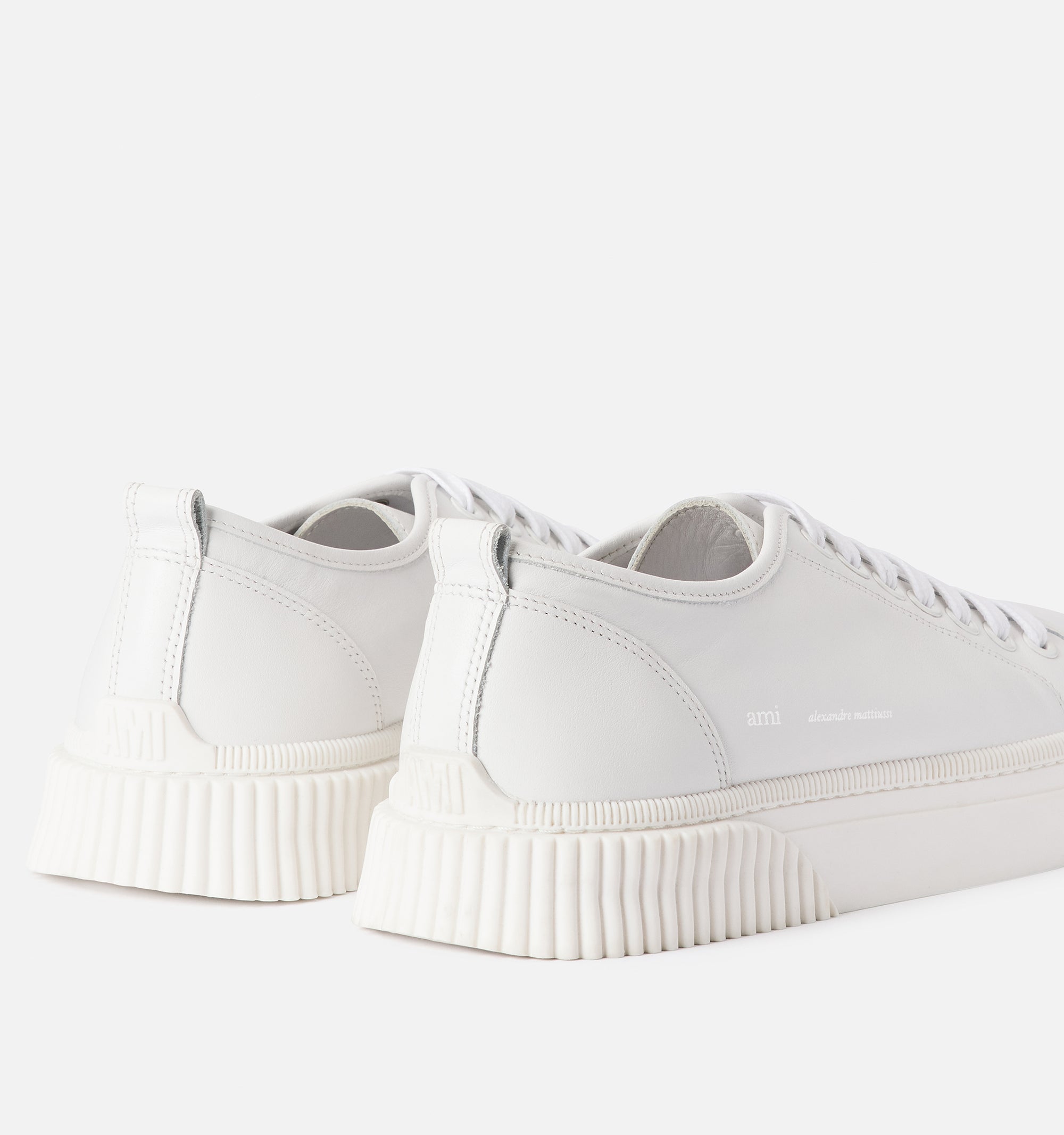 Sneakers basses à lacets en cuir - White