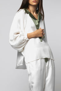 1 QTY RELIQUAT ST 25% QTY VENDU 1/4 BLOUSE EN SOIE BI-COLOR