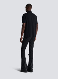 Polo en coton avec étiquette balmain couture en cuir - Noir
