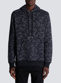 Hoodie imprimé motif étiquette balmain all-over - Noir & Blanc