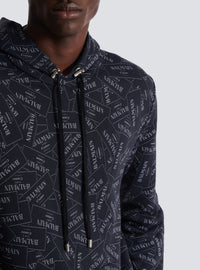 Hoodie imprimé motif étiquette balmain all-over - Noir & Blanc