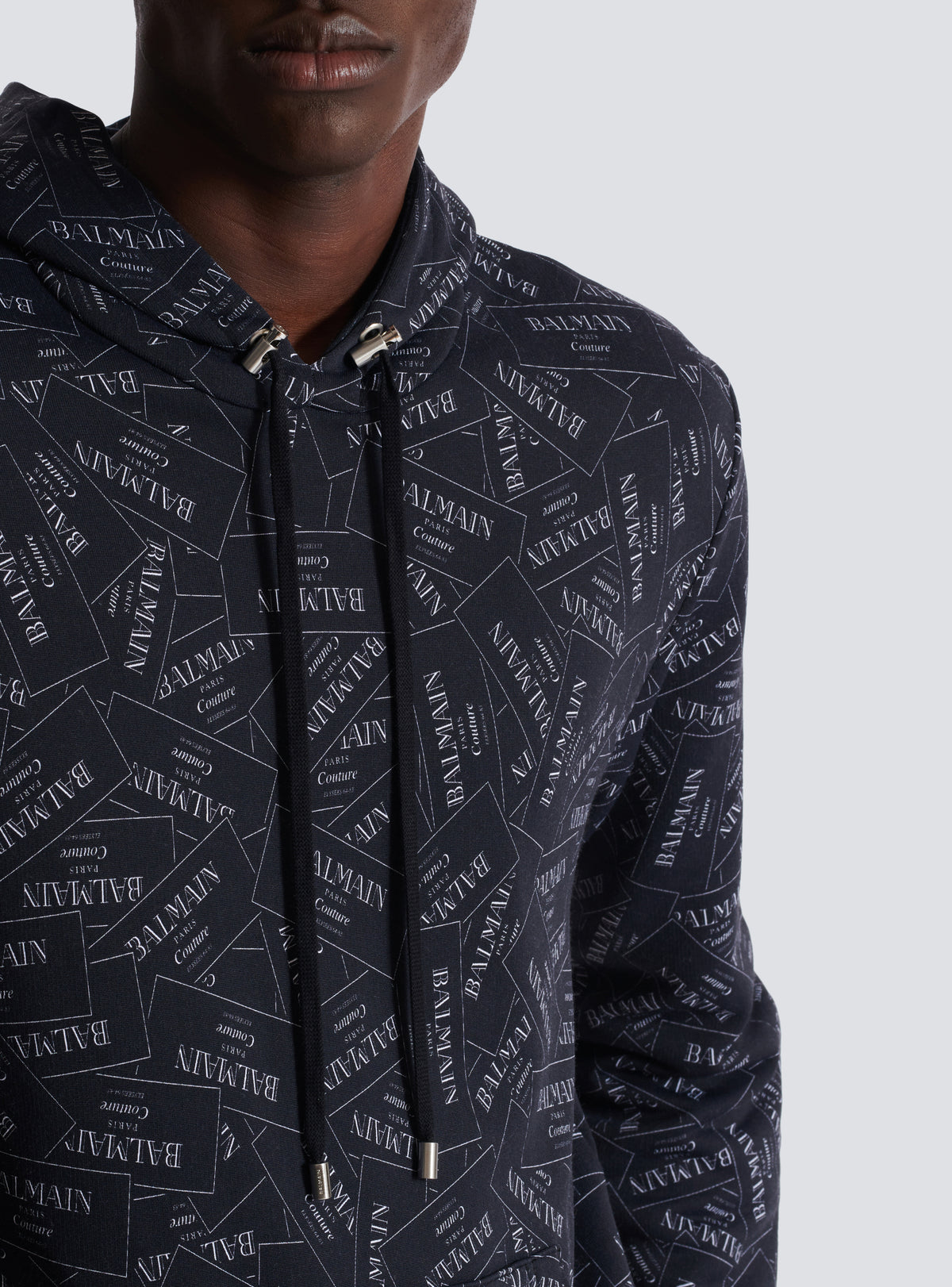 Hoodie imprimé motif étiquette balmain all-over - Noir & Blanc