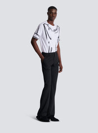 Pantalon de tailleur bootleg en grain de poudre - Noir