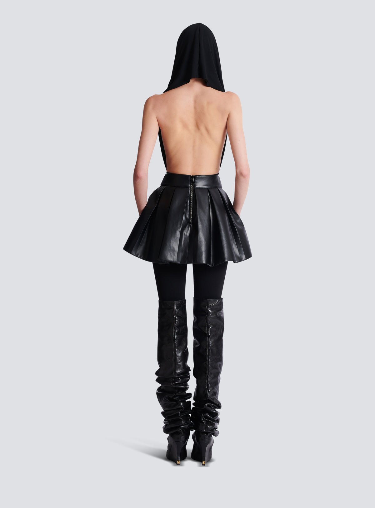 Jupe courte plissée en cuir synthétique - Noir