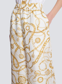 Pantalon fluide en soie imprimée motif balmain chaînes - Blanc & Or