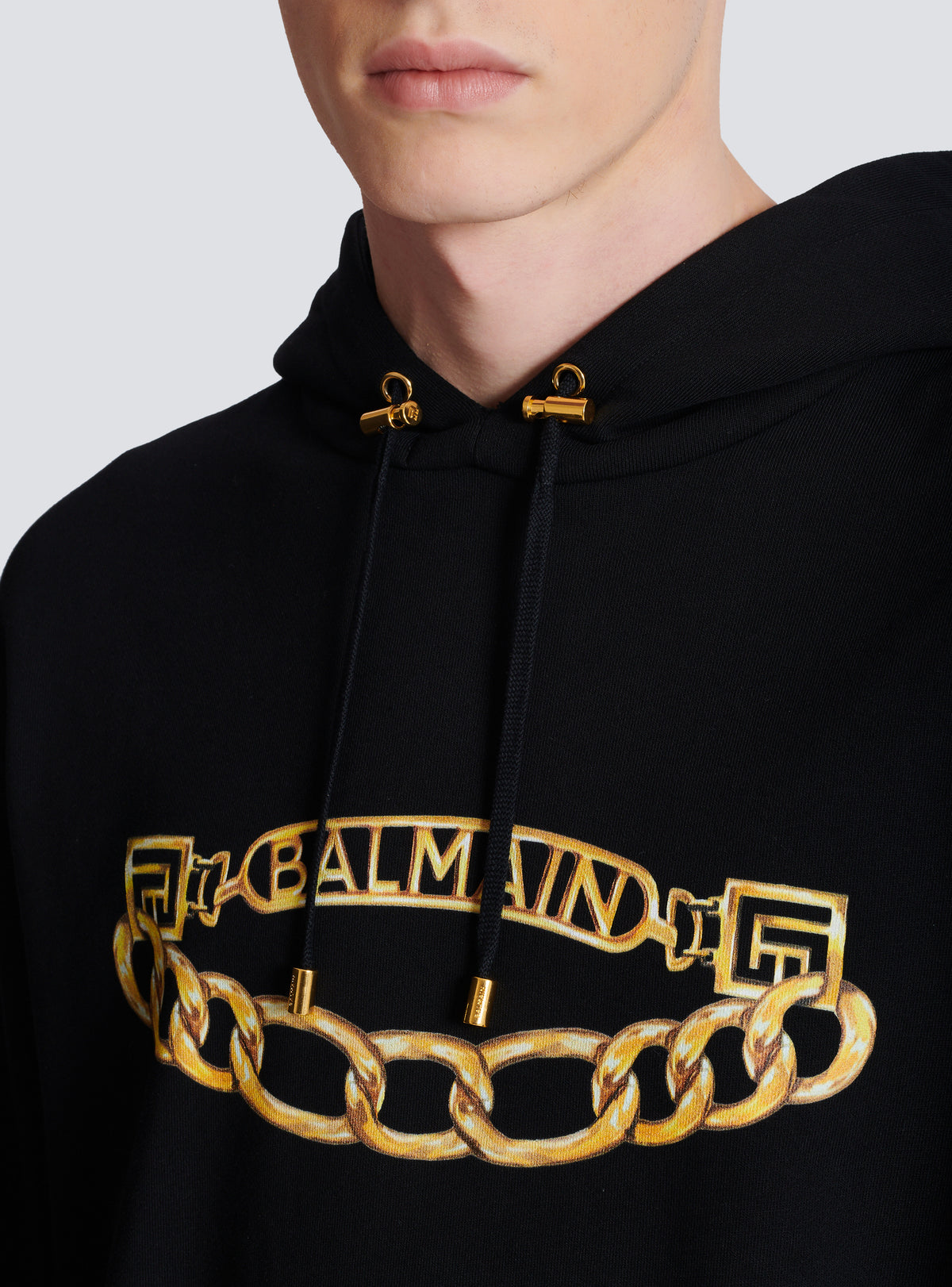 Sweat à capuche avec logo et chaines - Noir & Or