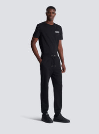 Pantalon de jogging en coton imprimé logo balmain - Noir & Blanc