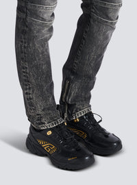 Baskets cosmic dust en cuir glacé - Noir & Or