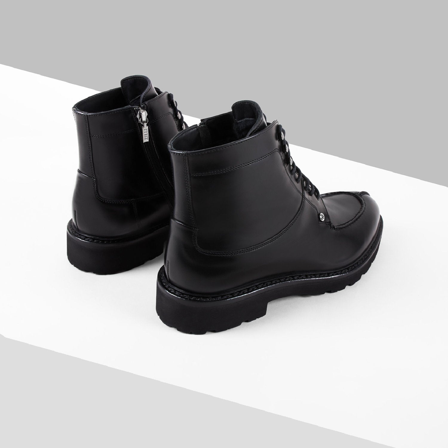 Bottines à lacets et semelle crantée en cuir - Noir