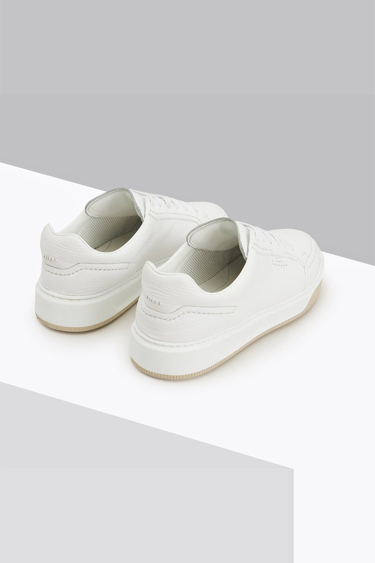 Sneakers basses en cuir précieux - White
