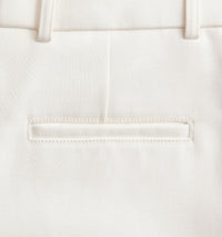 Pantalon coupe carotte à pinces en satin de coton - Off White