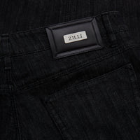 Jean à surpiqûres et empiècement cuir - Noir