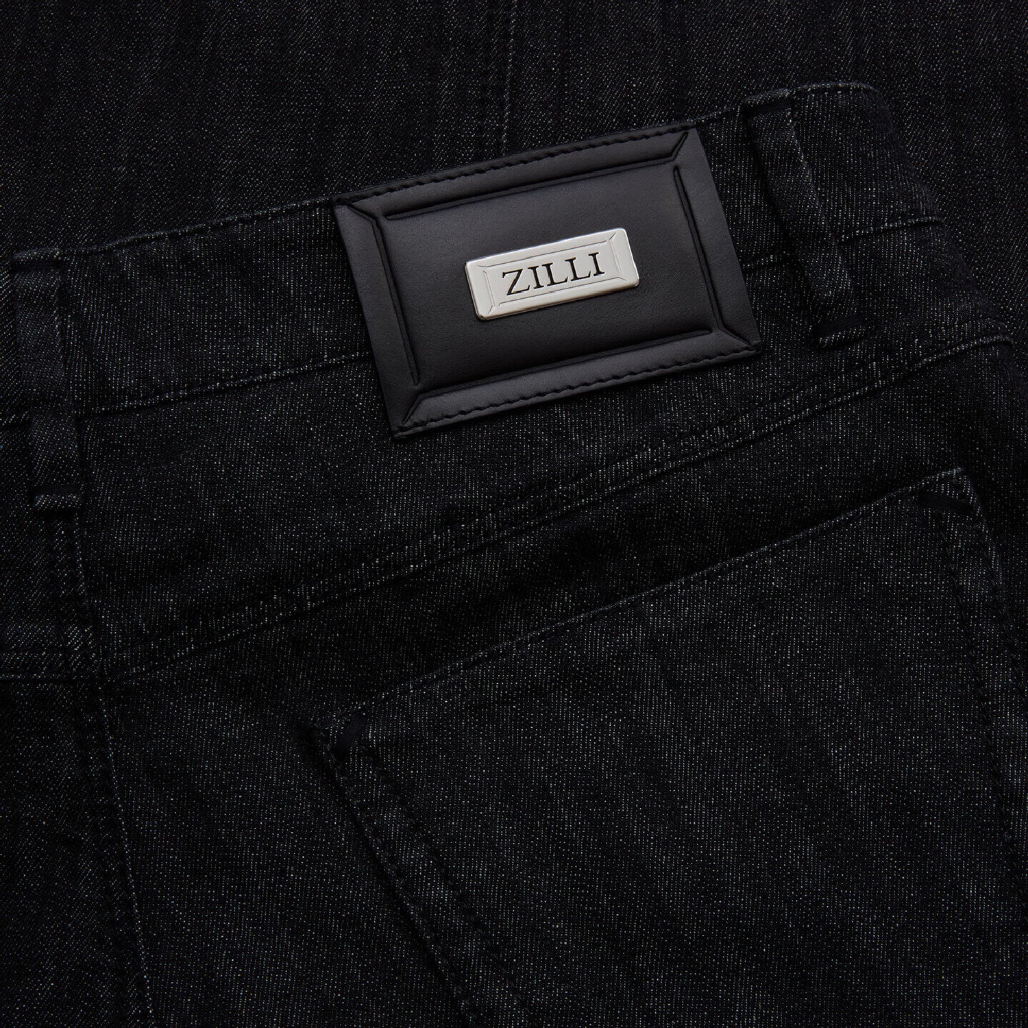 Jean à surpiqûres et empiècement cuir - Noir
