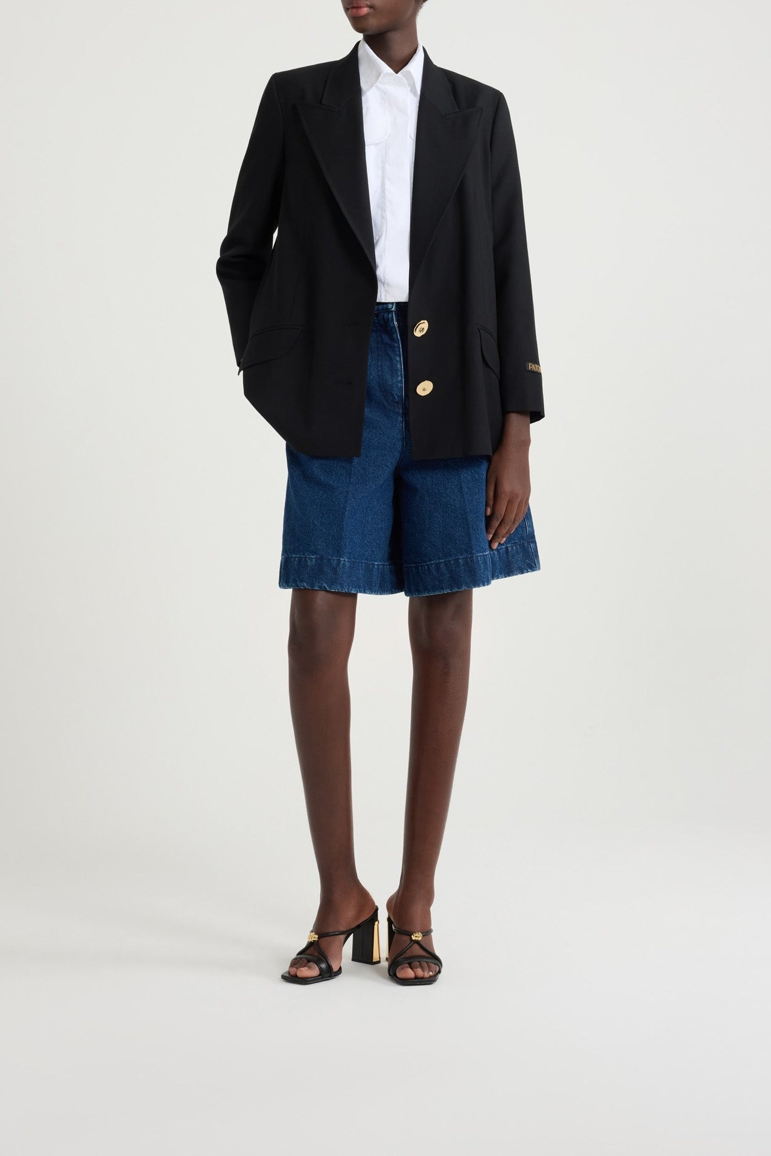 Veste en laine à bouton bijou