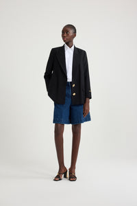 Veste en laine à bouton bijou