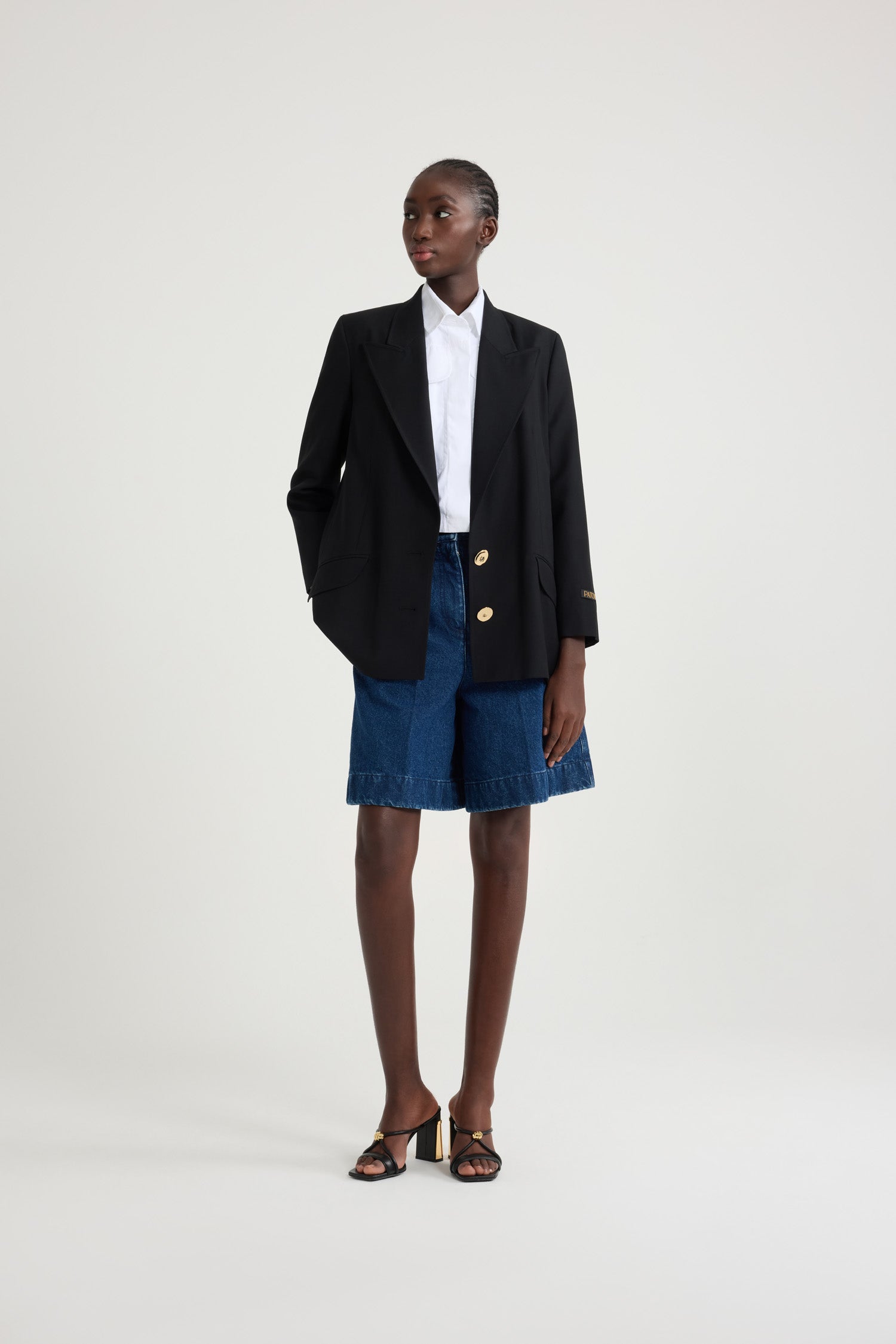 Veste en laine à bouton bijou