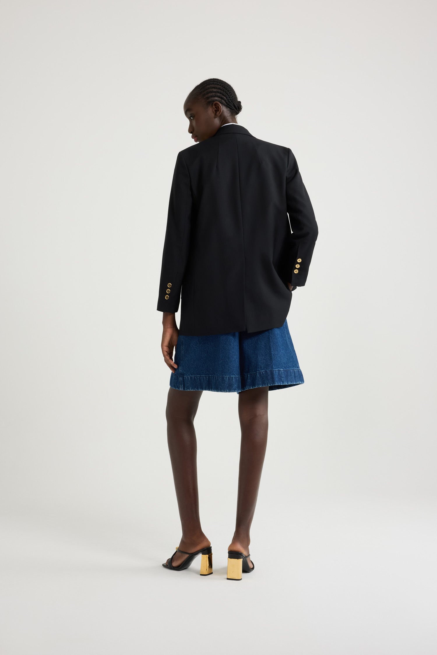 Veste en laine à bouton bijou