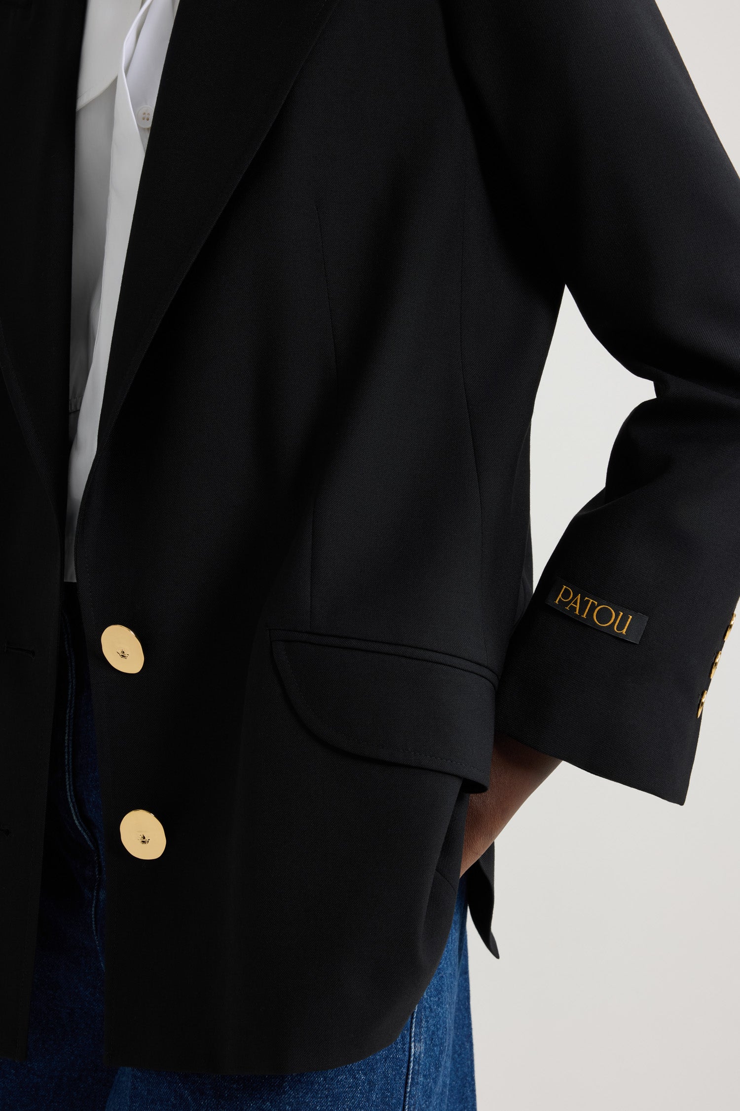 Veste en laine à bouton bijou
