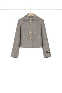 Veste courte en tweed stretch