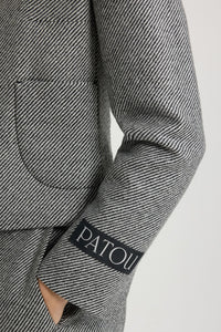 Veste courte en tweed stretch