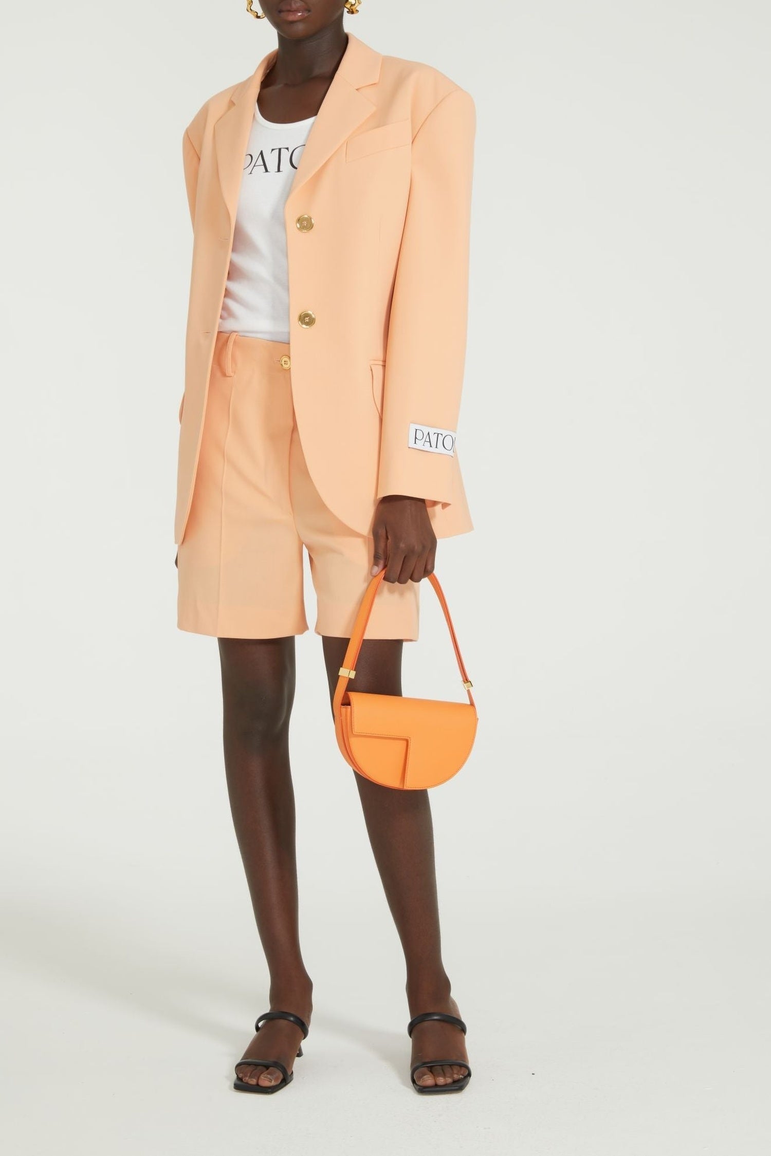 Veste ceinturée en laine technique
