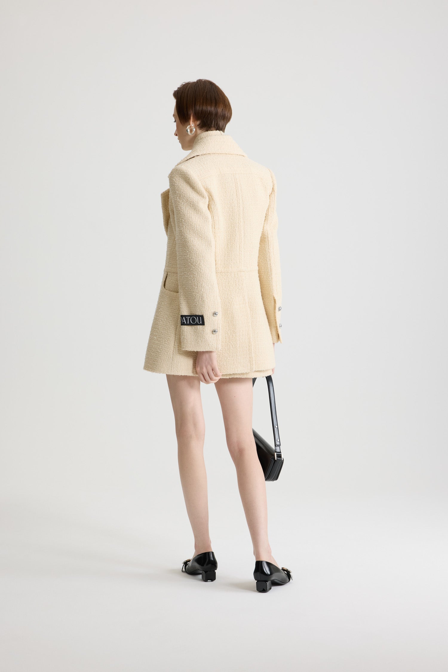 No Label Snowberry White / Veste longiligne à boutonnage simple en tweed de laine mélangée éco-responsable