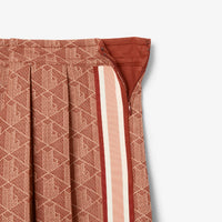 Jupe plissée en jacquard monogramme - Iberis & Latte