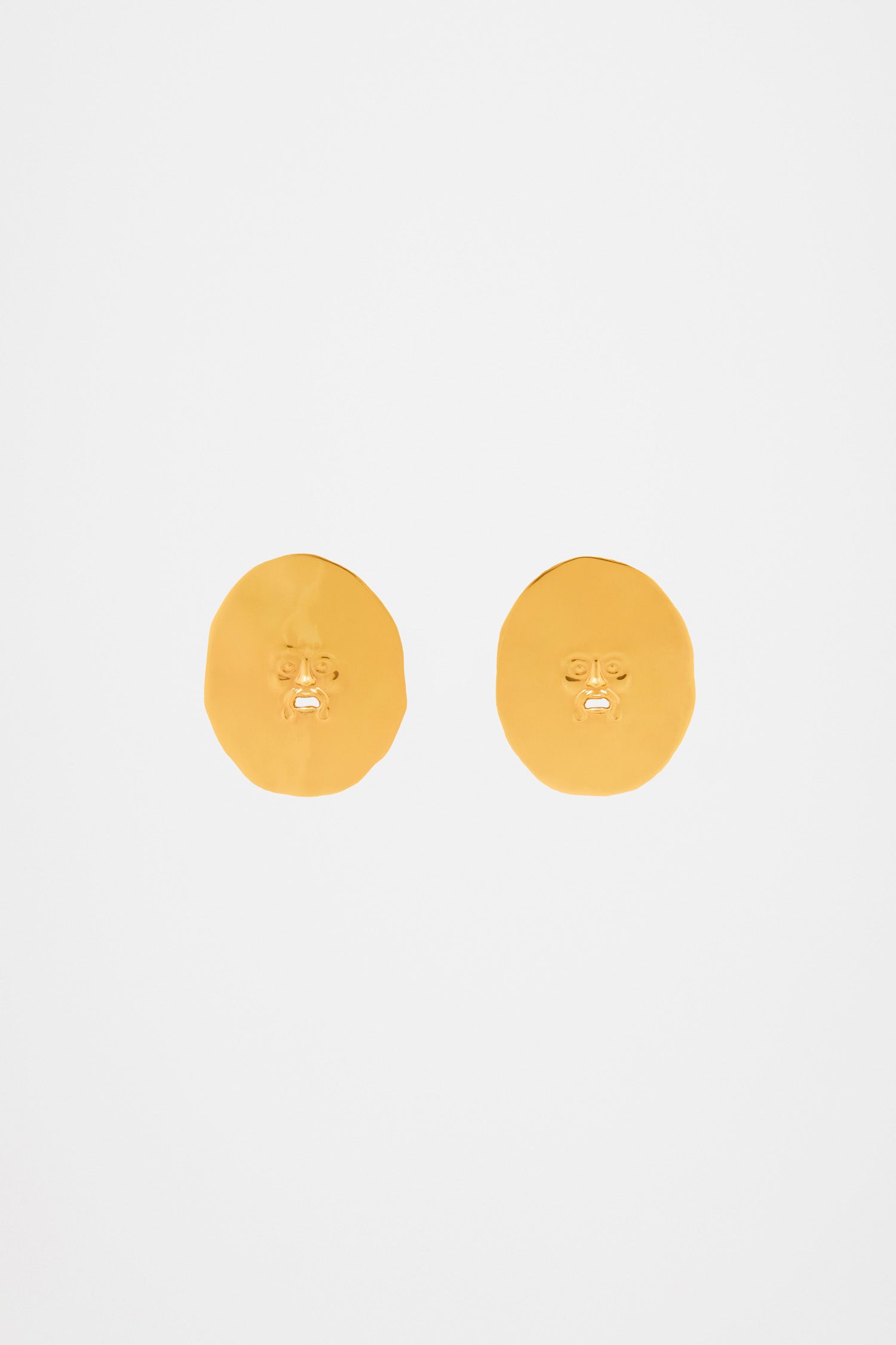 Boucles d’oreilles visage en laiton