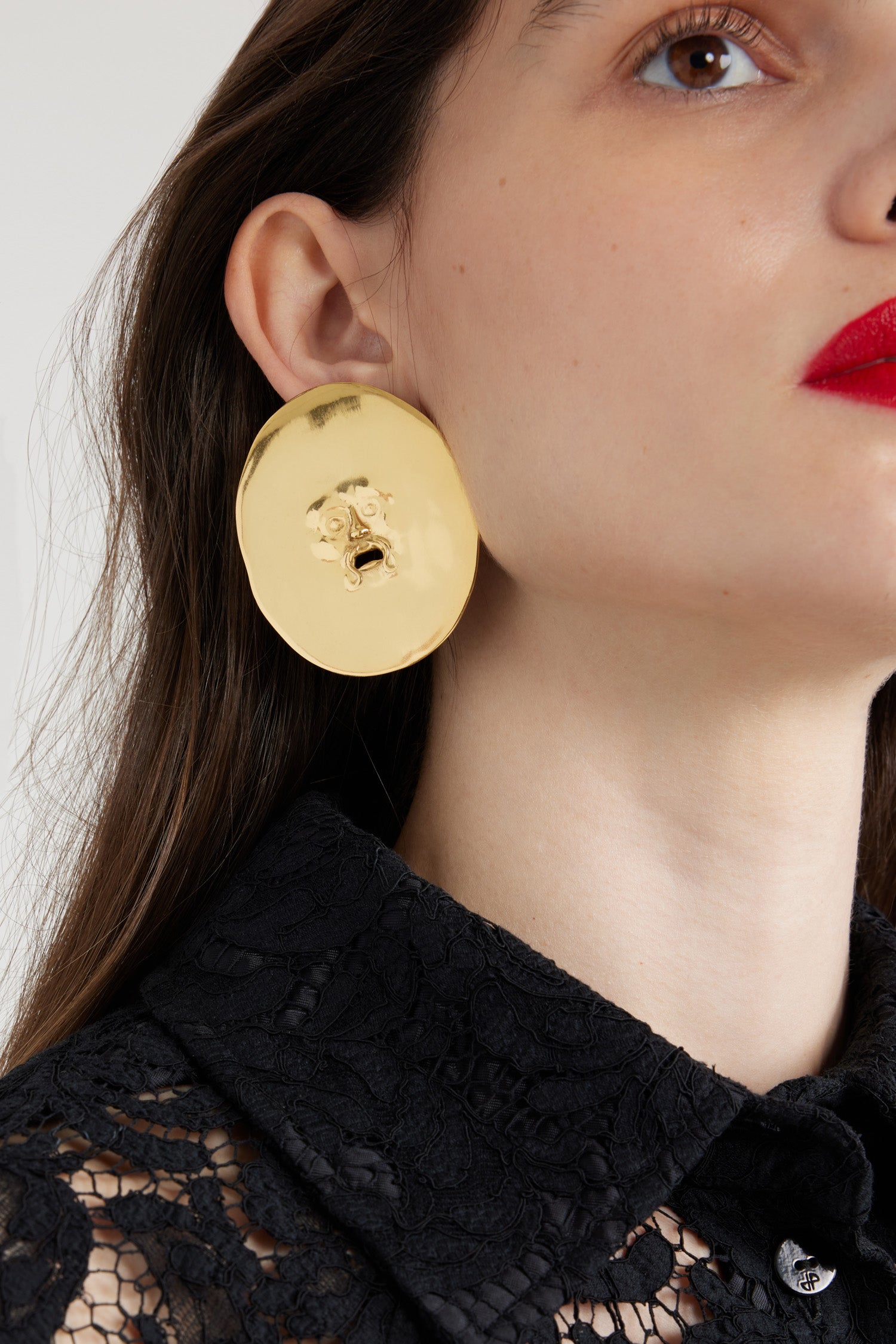 Boucles d’oreilles visage en laiton