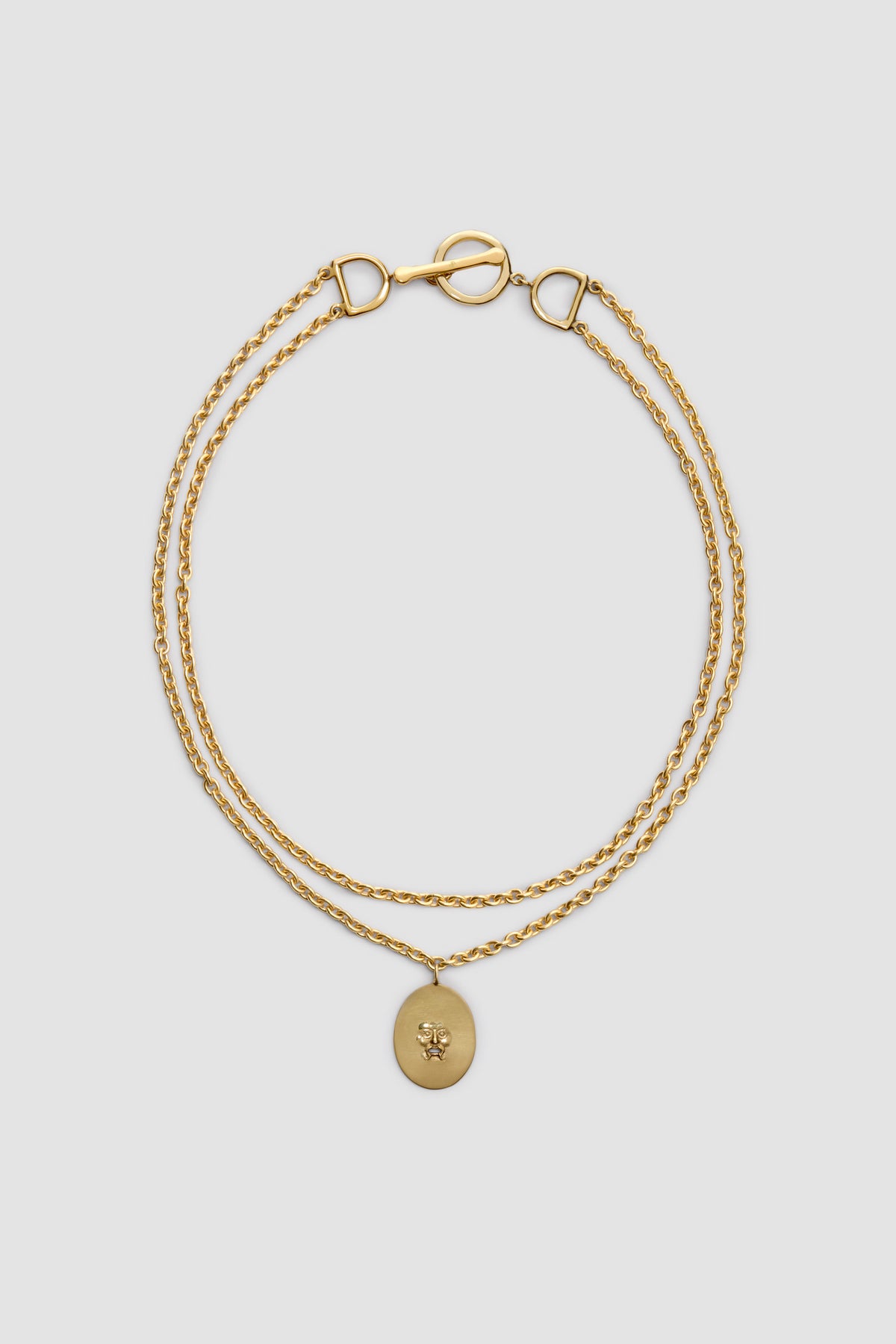 Gold / Collier à pendentif Bocca en laiton