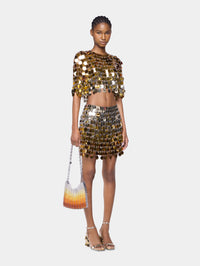 Gold mini skirt in gradient assembly