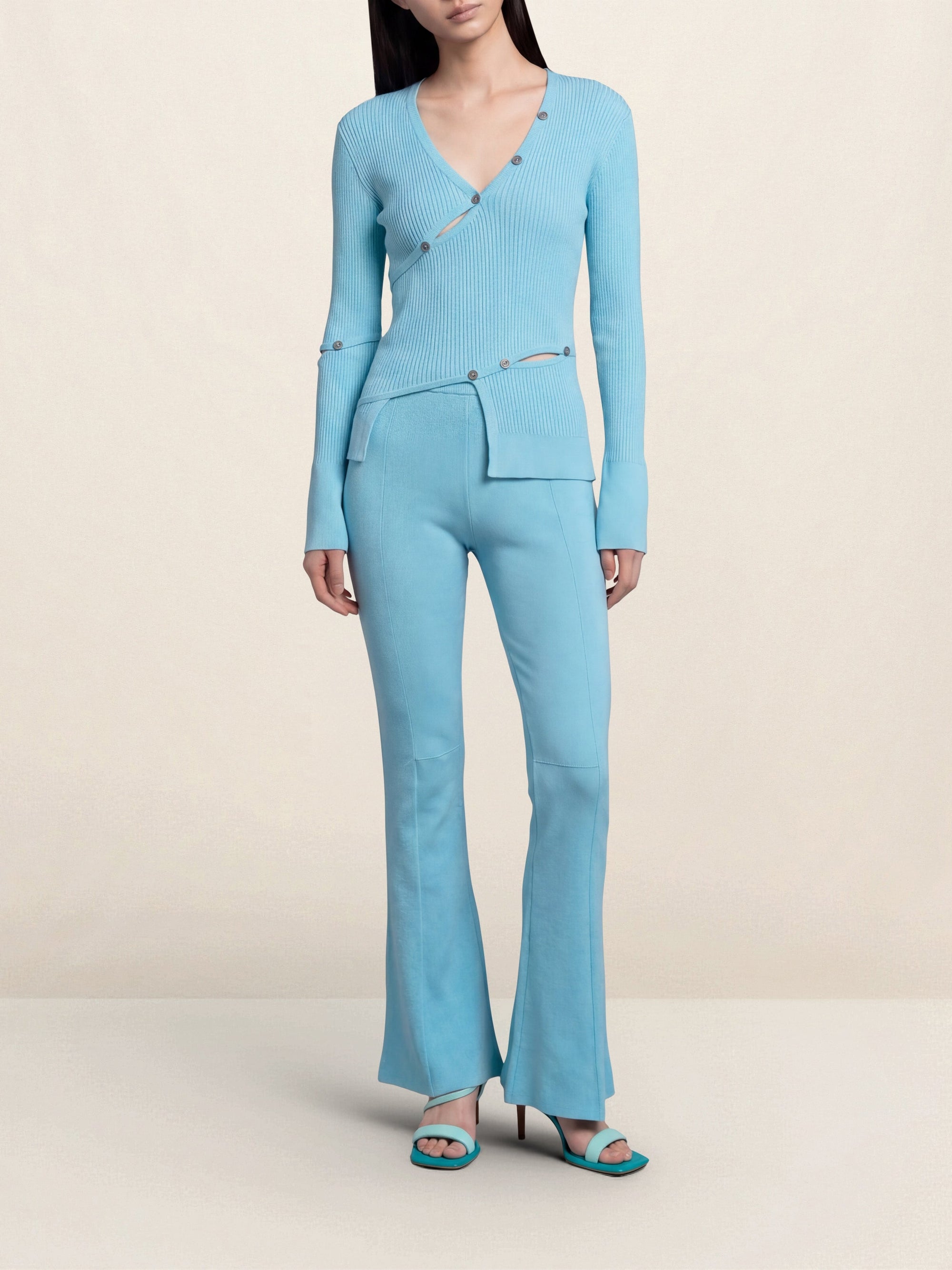 TURQUOISE LE CARDIGAN TORDU