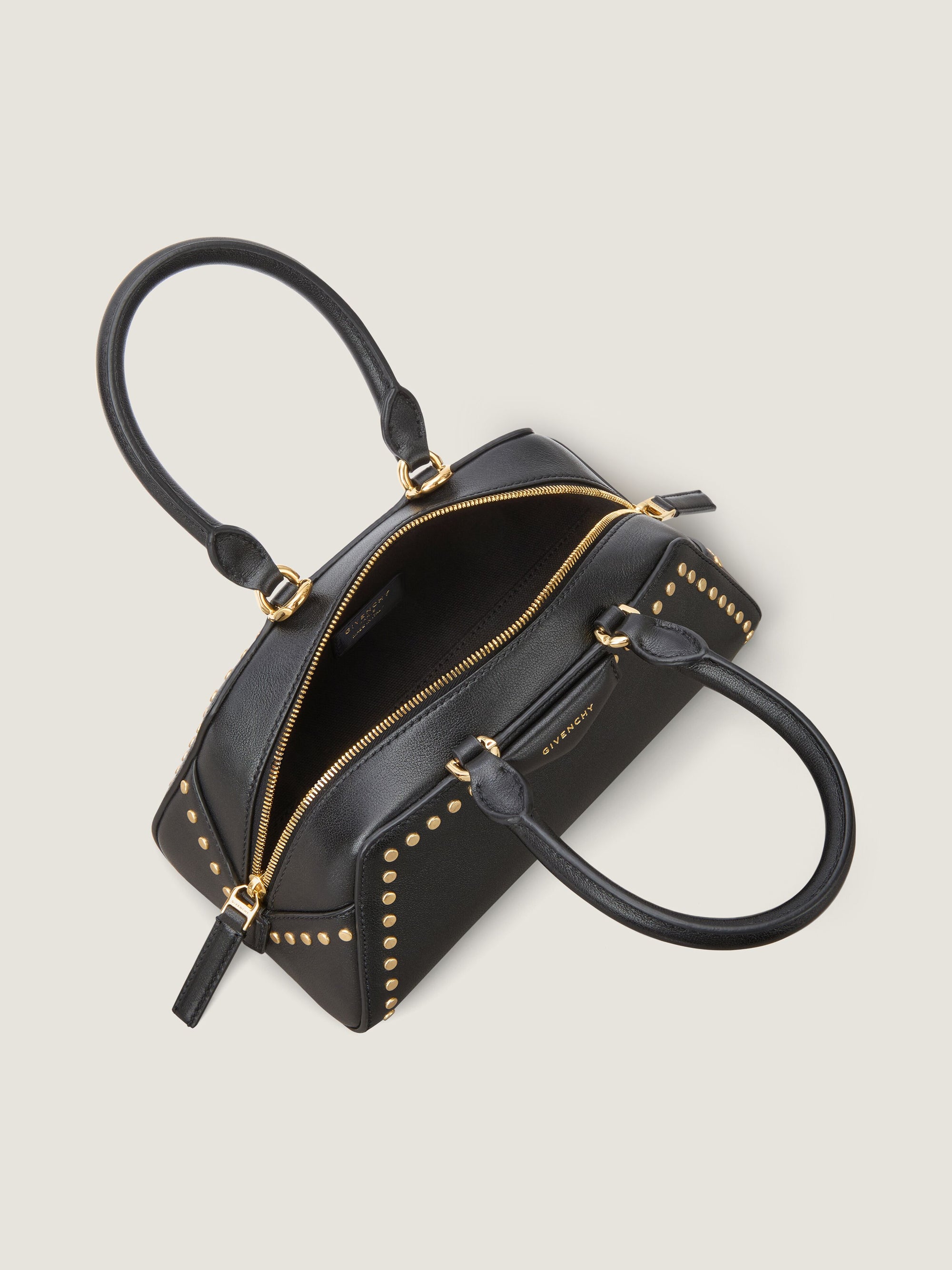 SMOOTH GRAINED LEATHER W/STUDS