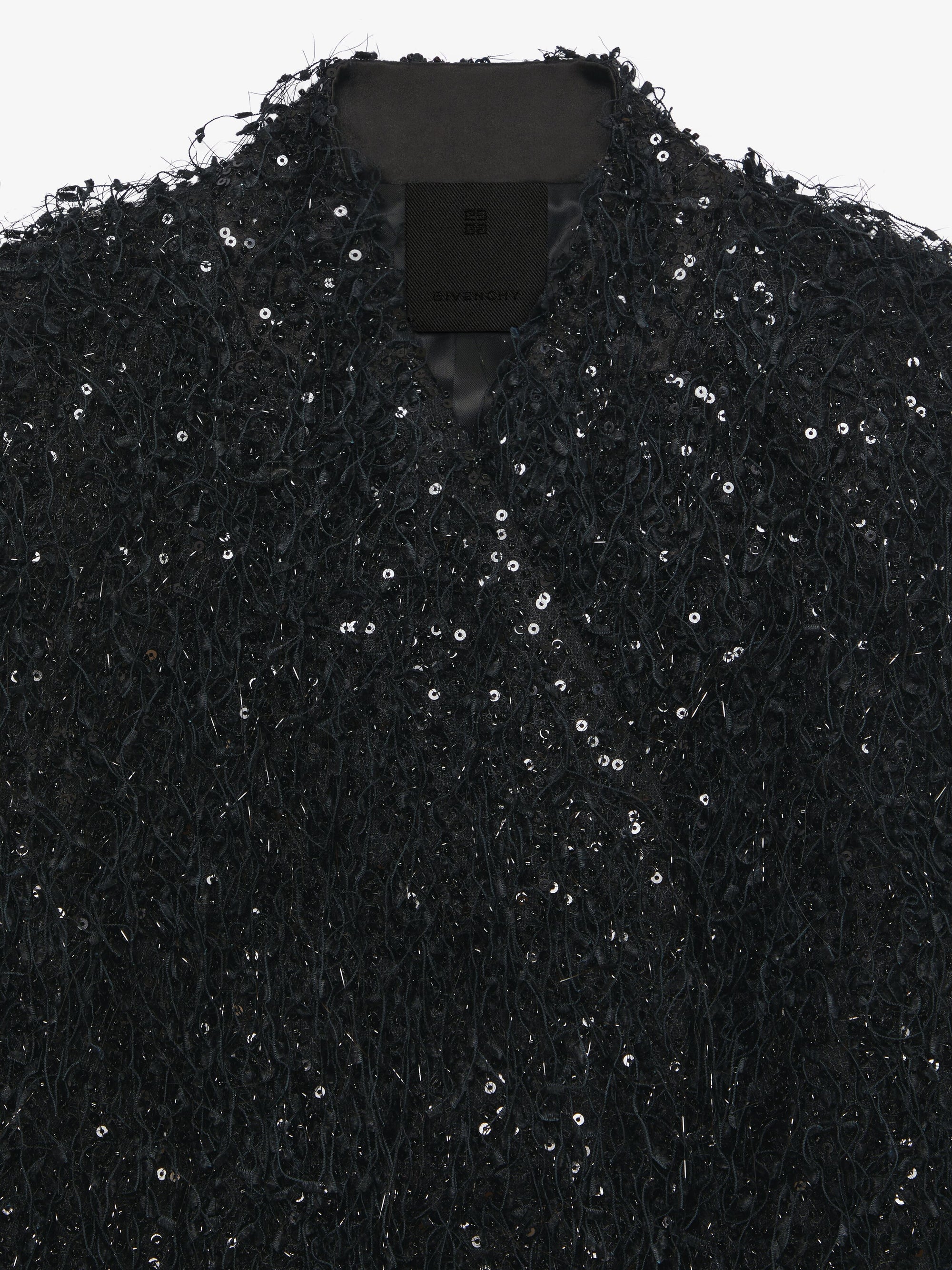 SEQUINS/PEARLS ON FRINGE FABRIC