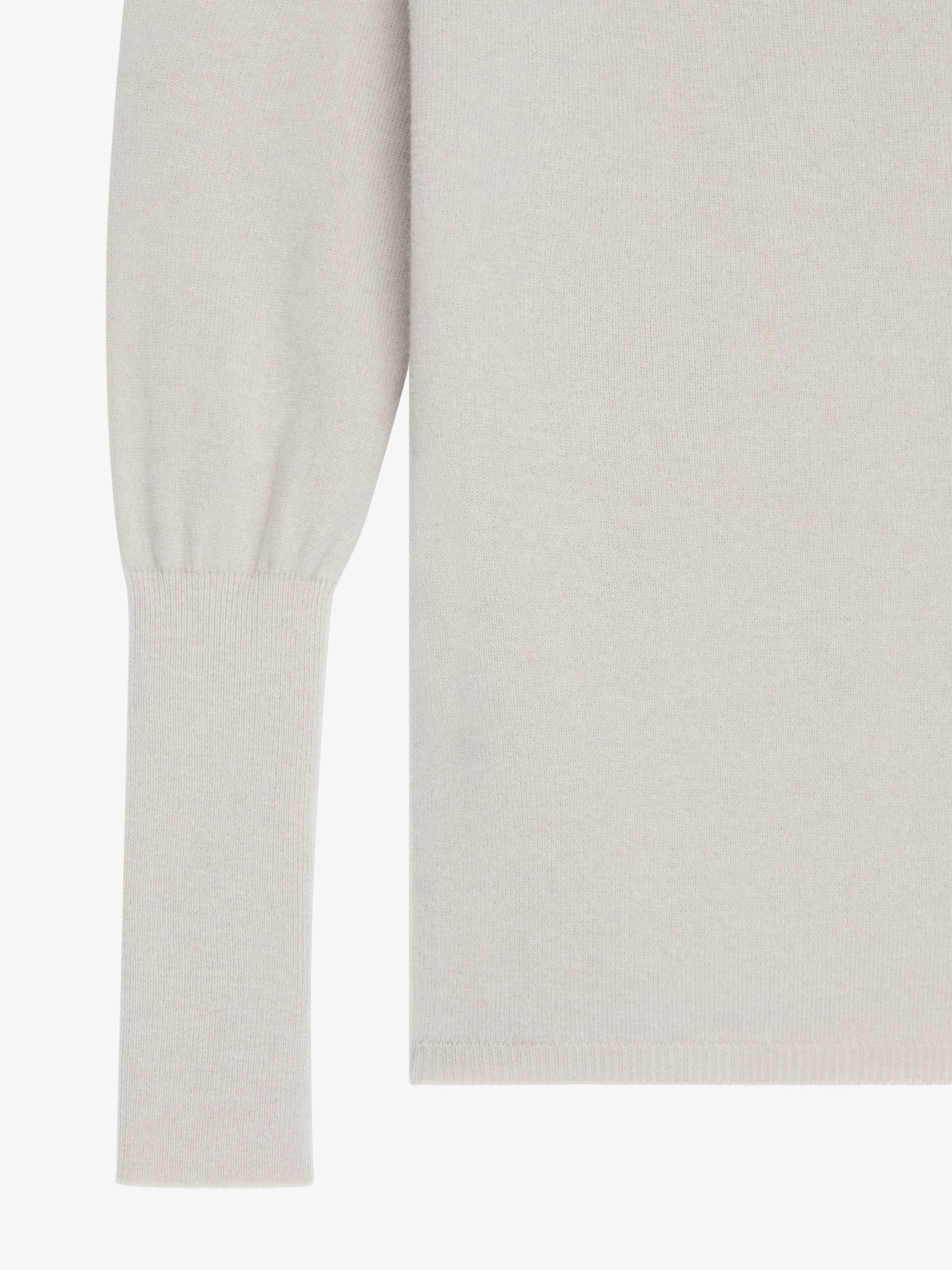 ASYMETRICAL DRAPED SWEATER